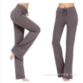 Pantaloni fitness da donna con taglio a stivale